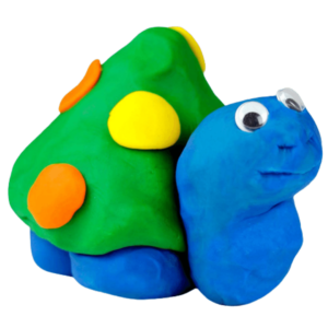 blue turtle made of playdough with a green shell and colorful dots