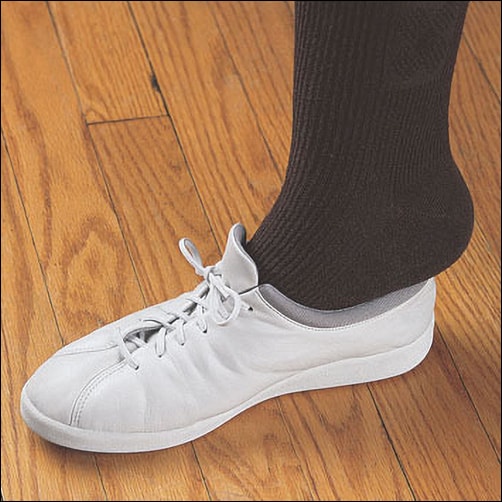 White shoe with white elastic shoelace a low tech solution for independence with self care 