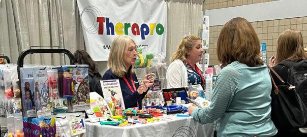 The Therapro booth at the 2023 AOTA annual conference buzzing with activity